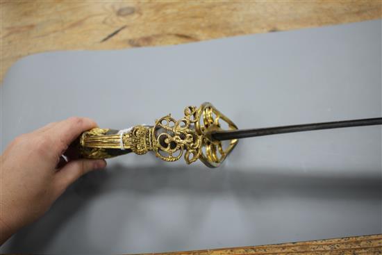 A Georgian infantry officers sword, fine gilt hilt, the curved blade gilt etched with GR and Royal Arms, blade 73.5cm, overall length